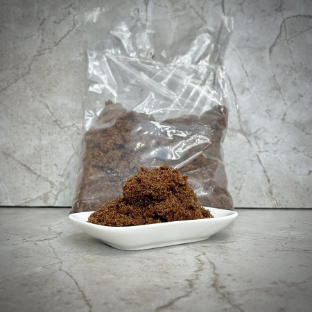 سكر بني رطب وزن نص كيلو